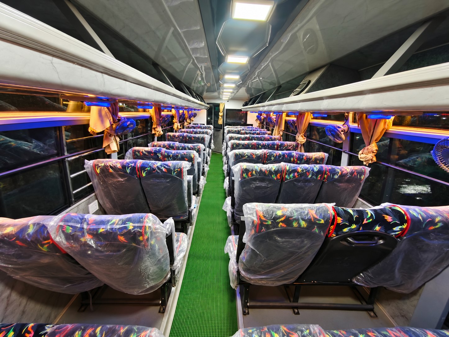 Empty centre aisle inside Pari Pallavi coach